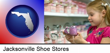 little girl holding a shoe in a shoe store in Jacksonville, FL