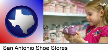 little girl holding a shoe in a shoe store in San Antonio, TX